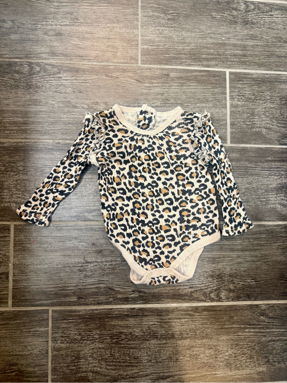 Size 3-6 month leopard onsie